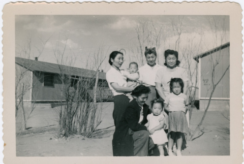 Domoto Family outside barracks (ddr-densho-329-959)