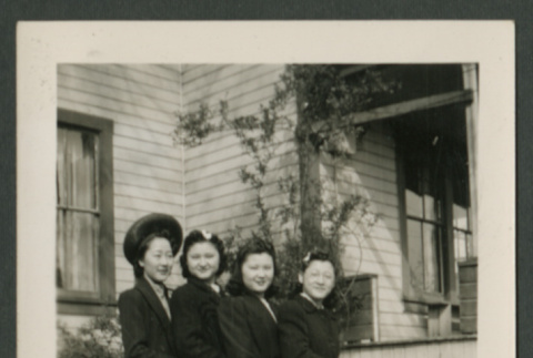 Four women pose outside of the house (ddr-densho-359-170)