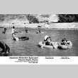 Group swimming in lake (ddr-ajah-6-235)