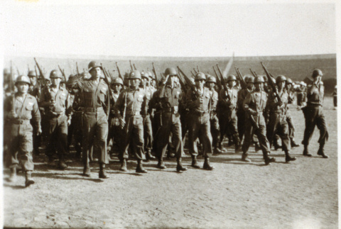 American soldiers marching (ddr-densho-1007-596)