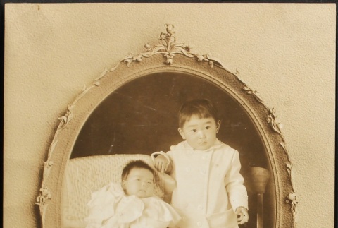 Portrait of two Nisei brothers (ddr-densho-259-199)