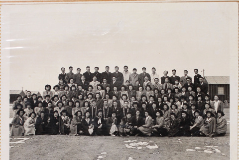 Large group photo outside barracks (ddr-densho-464-13)