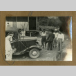 Japanese Peruvian men with a car (ddr-csujad-33-154)