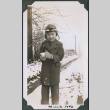 Photo of Kenji Ima holding a snowball (ddr-densho-483-1167)