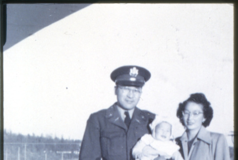 Soldier with family (ddr-densho-1007-722)