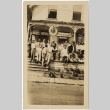 Photo of group of men on porch (ddr-densho-383-497)