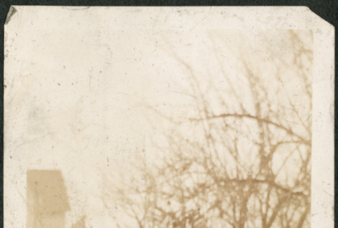 Three adults and one child holding doll (ddr-densho-293-54)