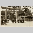 Men walking out of the gates of a shrine (ddr-njpa-8-51)