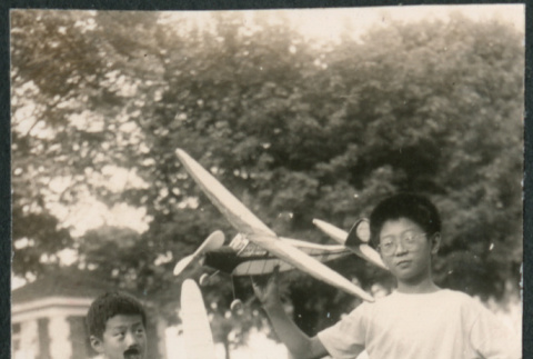 Three boys with model planes (ddr-densho-523-204)