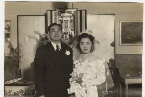Eiko in wedding dress with Ken (ddr-densho-349-32)