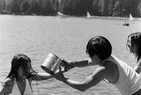 Pushing Julie Oji in the lake (ddr-densho-336-585)
