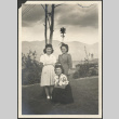 Three women on a lawn (ddr-manz-10-123)