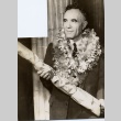 A man wearing leis (ddr-njpa-1-859)