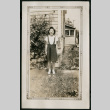 Woman in front of house (ddr-densho-359-407)