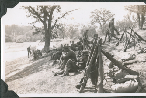 Men resting on hillside (ddr-ajah-2-183)