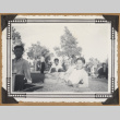 Group sitting on a lawn (ddr-densho-542-136)