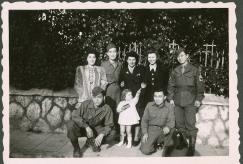 Four Soldiers pose with Three Women and a Child (ddr-densho-368-537)