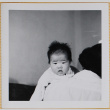 woman holding Leslie Shiomi (ddr-densho-522-356)