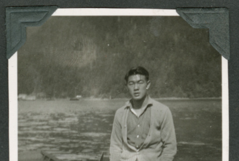 Toshiko Taniguchi standing near boat (ddr-densho-540-41)