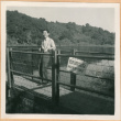 Henri Takahashi standing on bridge (ddr-densho-410-559)