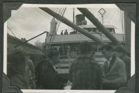 Men grouped near ship in background (ddr-densho-540-30)