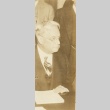Hiram Johnson sitting at a desk (ddr-njpa-1-522)