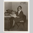 Woman at desk (ddr-hmwf-1-28)