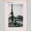 Woman standing in from of column. (ddr-densho-493-46)
