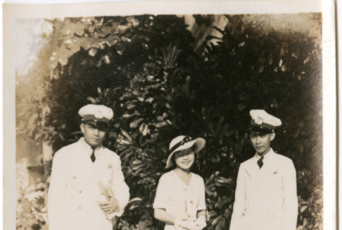 Tomoye (Nozawa) Takahashi with two ship's crew members (ddr-densho-426-1533)