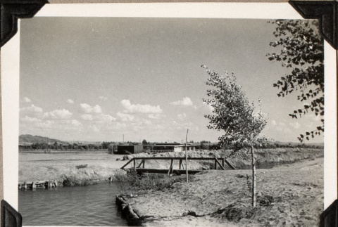 Bridge over river (ddr-densho-587-12)