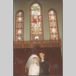 Bride and groom by stained glass (ddr-densho-523-600)