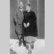 Issei couple standing in the snow (ddr-densho-102-16)