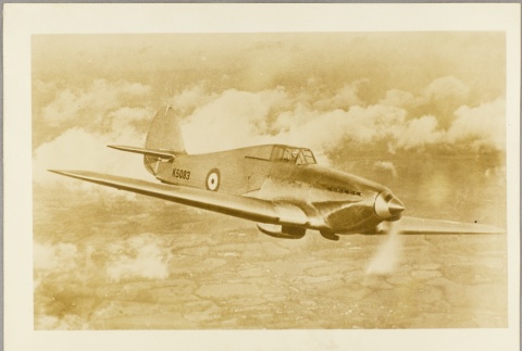 A British plane flying over a rural area (ddr-njpa-13-206)