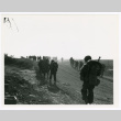 Naval air members walking on dirt road (ddr-densho-1007-139)