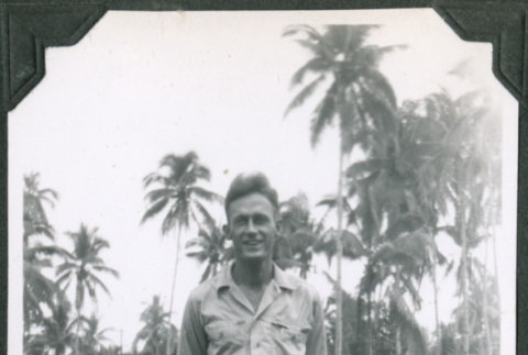Man standing by trees (ddr-ajah-2-664)