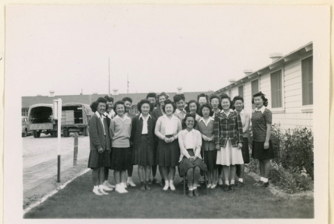 Delta Phi Sigma group poses with Mary Moriguchi (ddr-densho-37-1045)