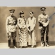 Zhang Xueliang in military dress posing with two women and a man (ddr-njpa-1-125)