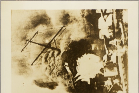 Photos of German sailors and a ship under attack, with a clipping photo of the Admiral Graf Spee on reverse (ddr-njpa-13-966)