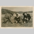 Man and two women digging in dirt (ddr-densho-201-435)