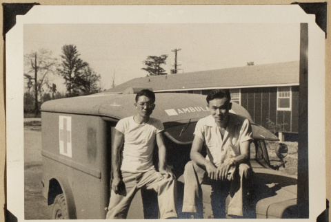 Frank and Hoyo with an ambulance (ddr-densho-542-561)