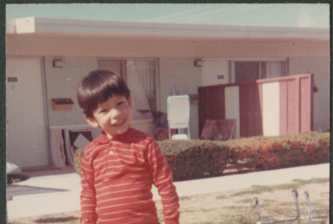 Barefoot boy on lawn (ddr-densho-523-552)
