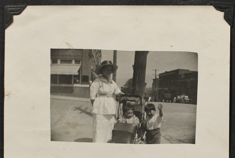 Issei mother and sons on the street (ddr-densho-259-186)