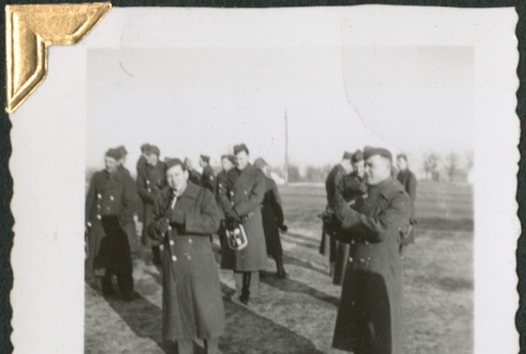 Men in uniform standing in field (ddr-densho-434-68)