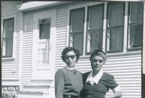 Two women outside house (ddr-densho-523-238)
