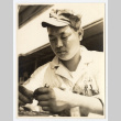 Man holding tools (ddr-densho-542-805)