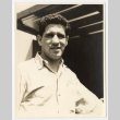 Portrait of man slightly smiling (ddr-densho-542-807)