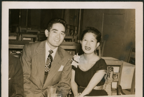 Couple sitting at a table (ddr-densho-379-487)
