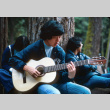 Kyle Kashima playing guitar (ddr-densho-336-993)