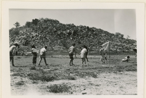 Marble hunt at a picnic (ddr-densho-37-1078)