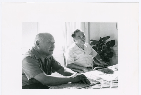 Two seated at table (ddr-densho-1007-258)